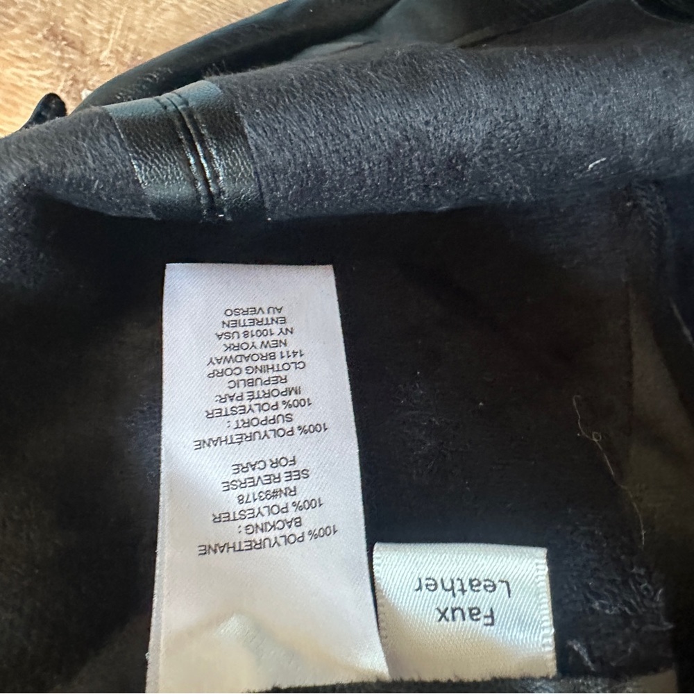 Women's Black Faux Leather Mini Skirt with Asymmetrical Zip Detail - Picture 5 of 5